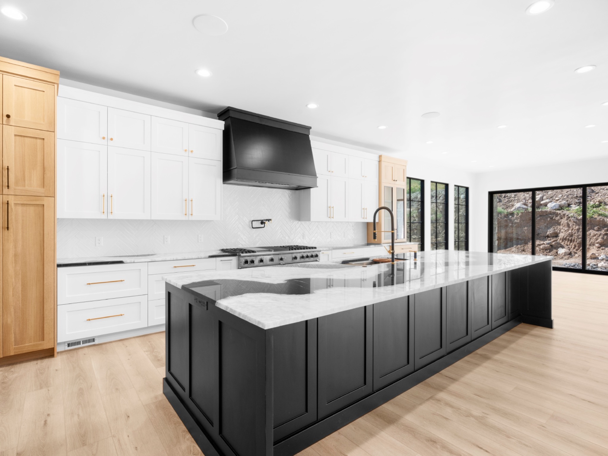 Black island kitchen — overview