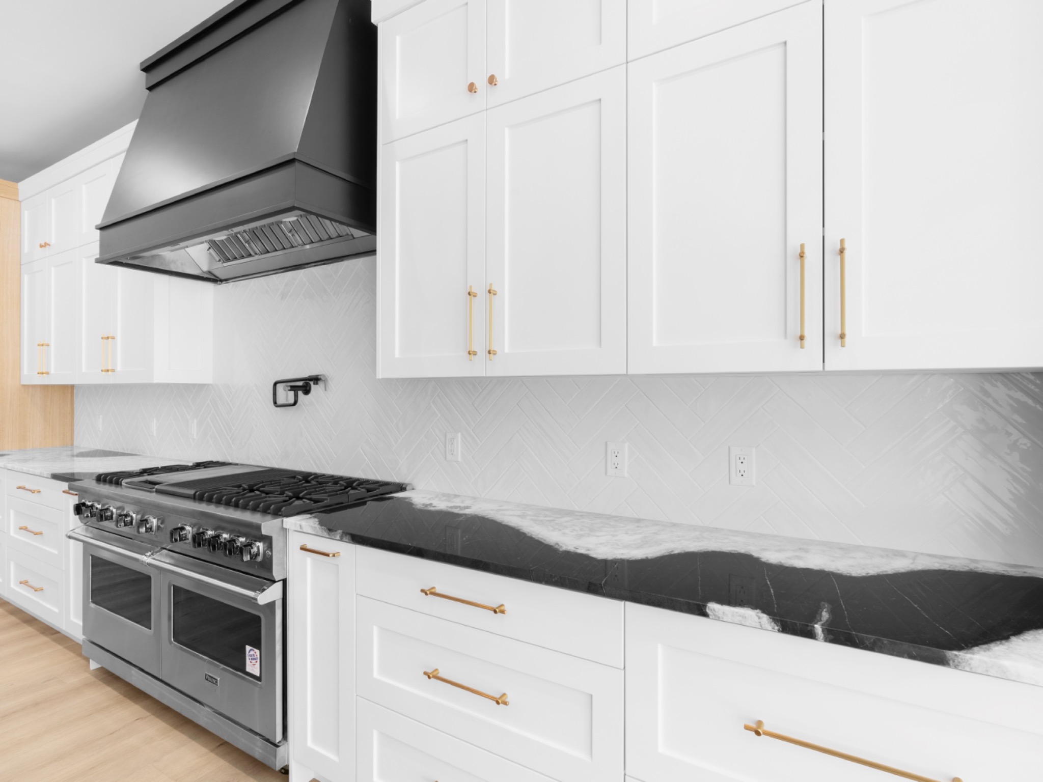 White shaker kitchen with black marble