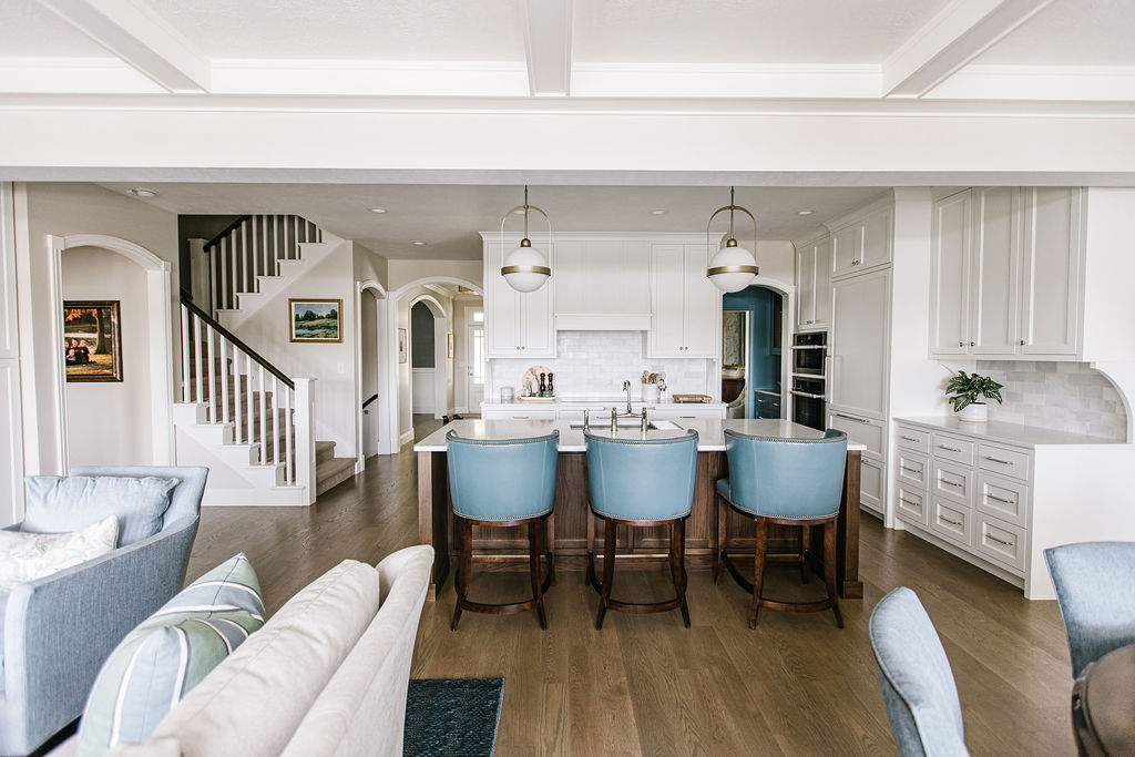 Open-concept kitchen and living area with coffered ceilings